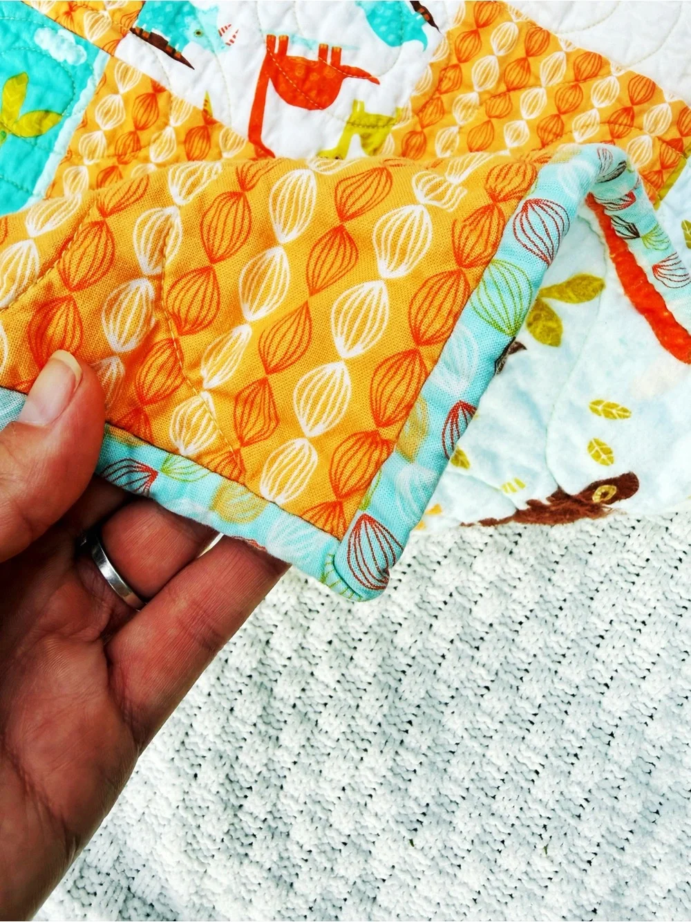 Playful Dino Patchwork Handmade Baby Quilt - Aqua & Orange